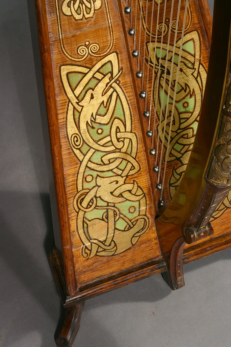 Polychrome and gilded decorations adorning James McFall harp