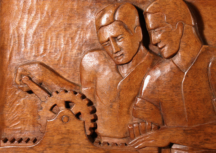 Photos above: The Evolution of the Book, Wood Sculptural Relief by Peterpaul Ott, detail before and after conservation