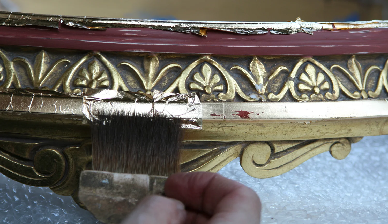 applying_gold_leaf.jpg