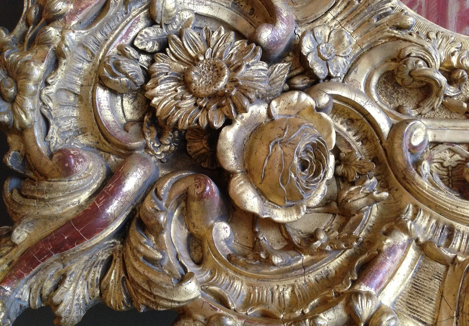 Gilt floral cartouche - rich detail of an ornamental 19th century giltwood frame