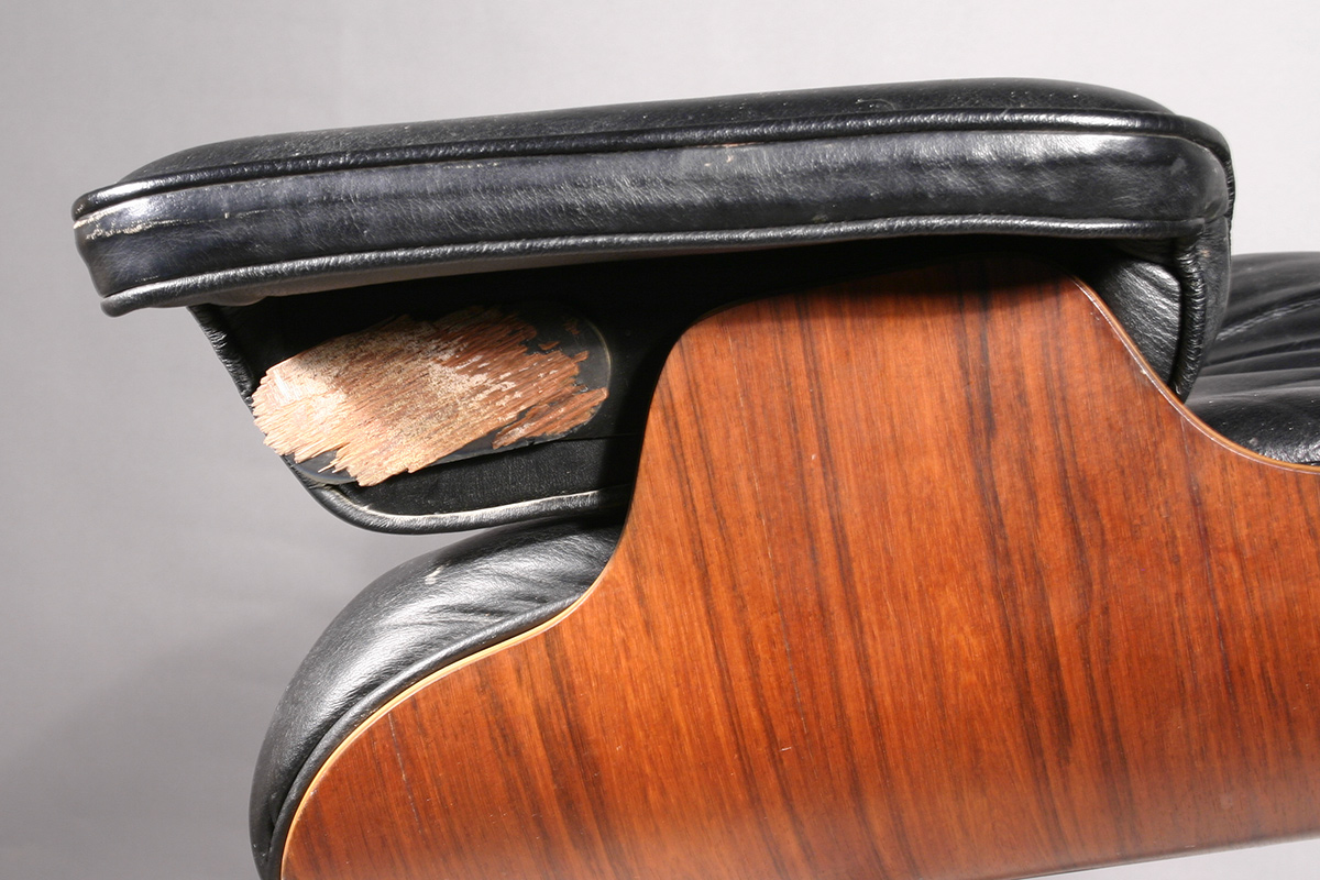 Eames chair damage: bent plywood separation at surface veneer layer