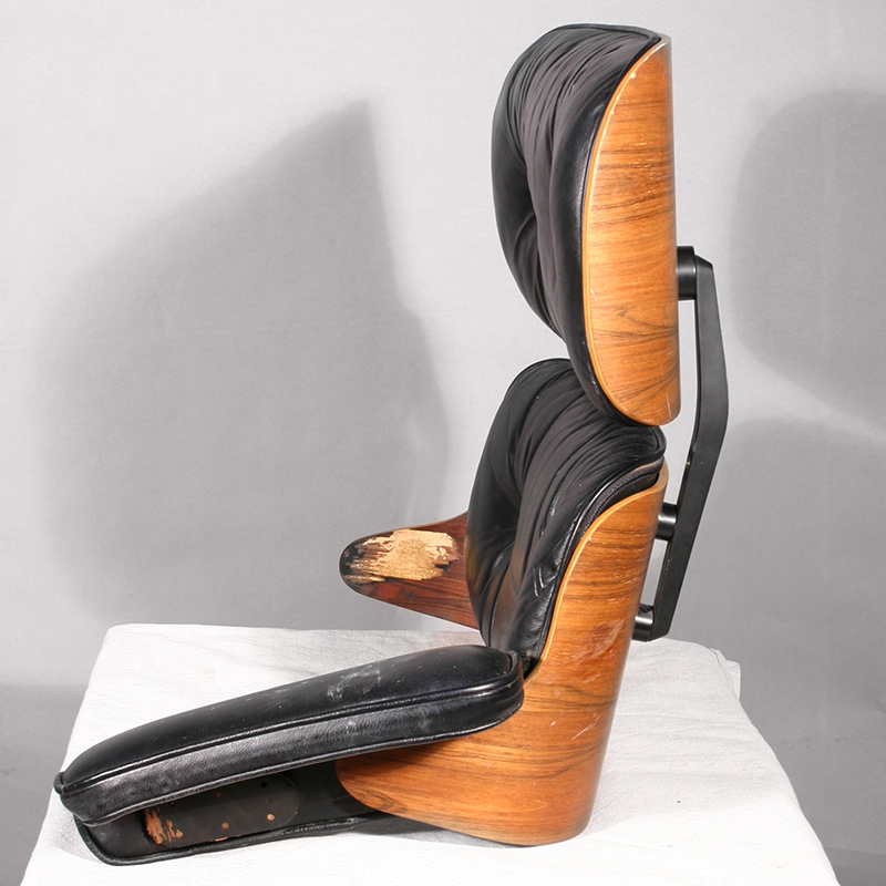 Damaged Eames lounge chair