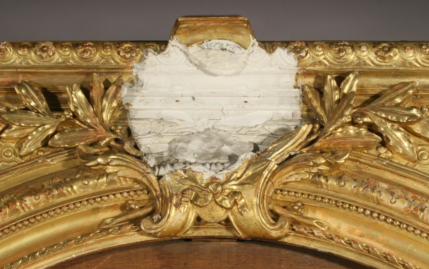 Giltwood frame mirror detail before conservation