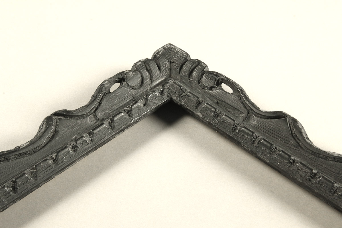A charming carved profile with a folk design and painted finish.