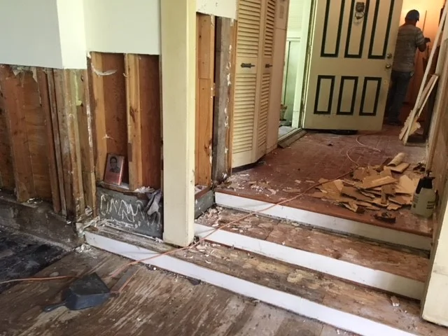 Our contractor had begun to demo the walls and remove the floors…
