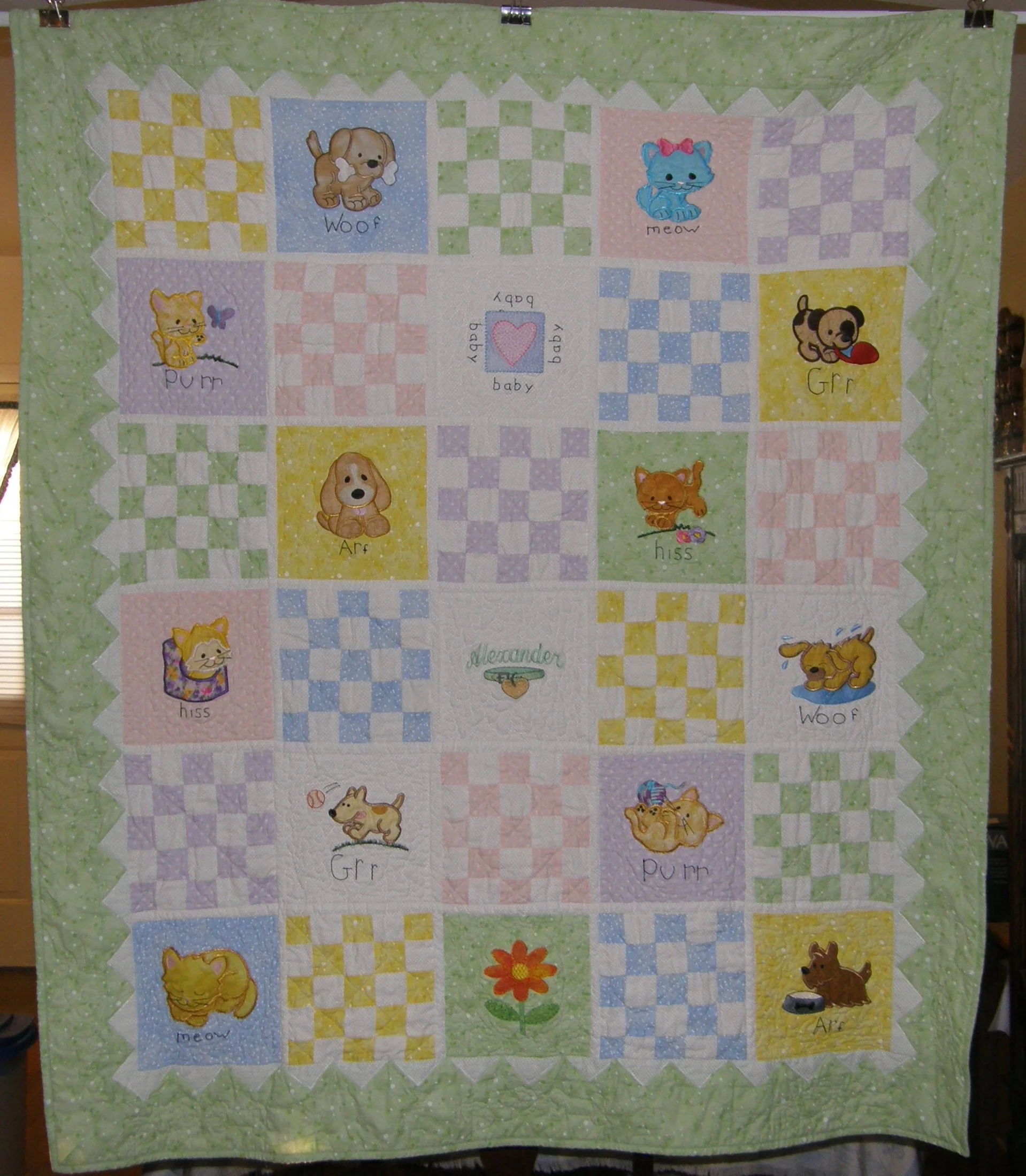 Alexander dog and cat quilt.JPG