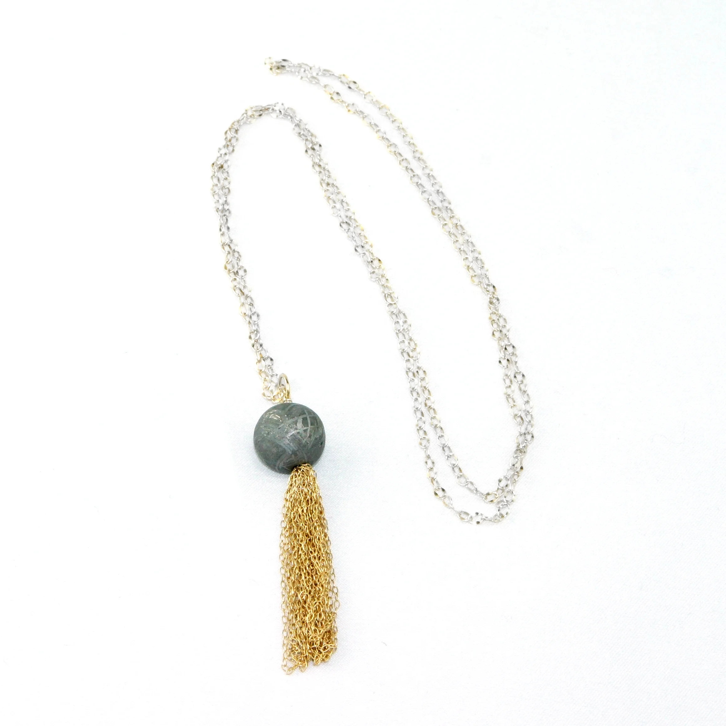 meteorite gold tassel.jpg