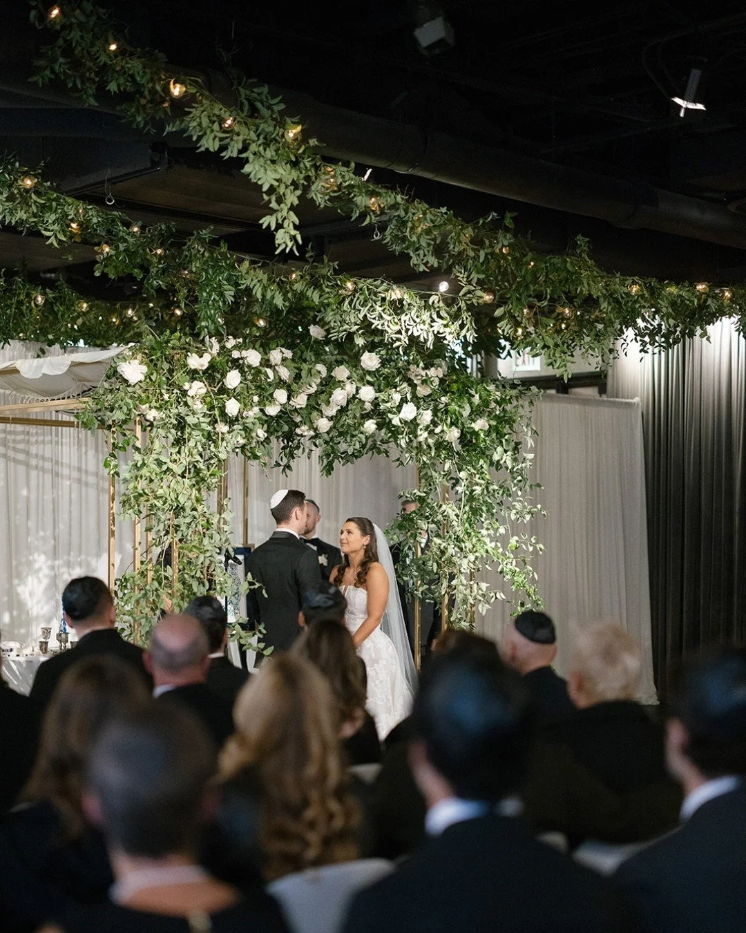 A chuppah moment we&rsquo;ll never forget 🤍✨ 🌿

Emily + Brad were surrounded by romantic white florals, lush natural greenery, and thoughtfully layered design from our friends at Fleur - every detail setting the stage for the pure joy of saying &ld