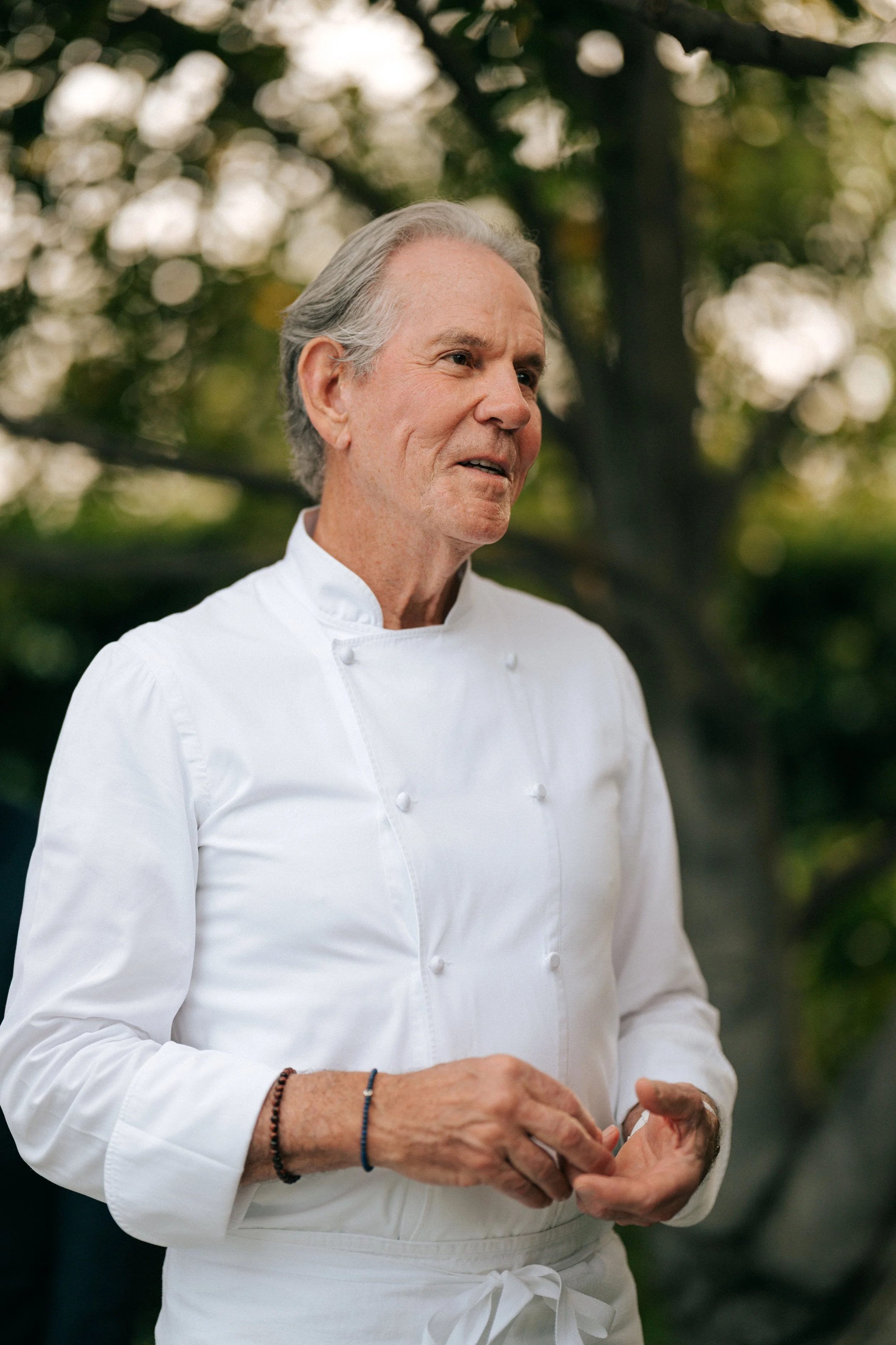 Thomas Keller, candid portrait in dappled garden light