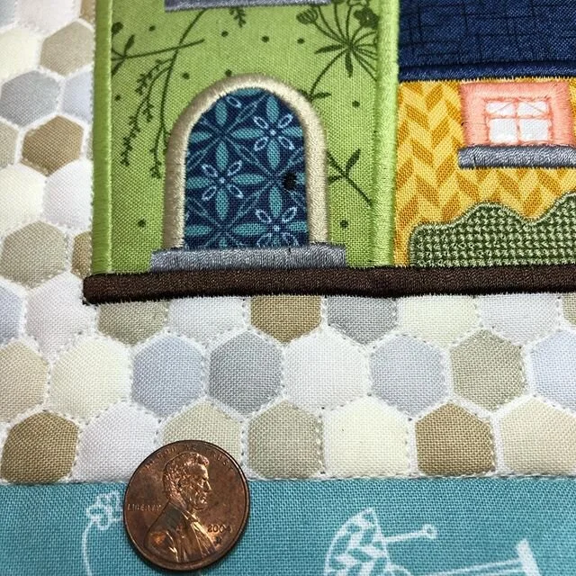 Yes I am stitching around all of these printed hexies. I&rsquo;m insane I know! Penny for size reference. #sewfabamy #handiquilter #longarmquilting #kimberbelldesigns