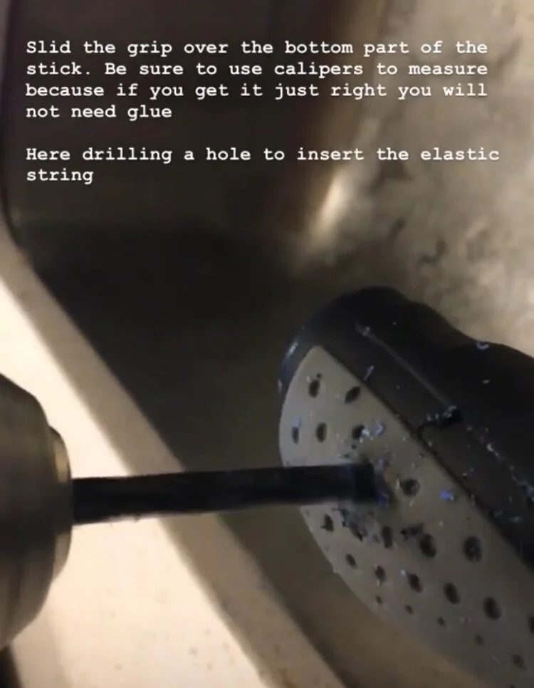 Figure 5: A small hole just wide enough to pass the elastic string through is made through the grip and the 3D printed stick.