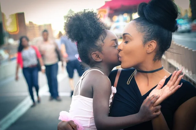 mom-girl-kiss.jpeg