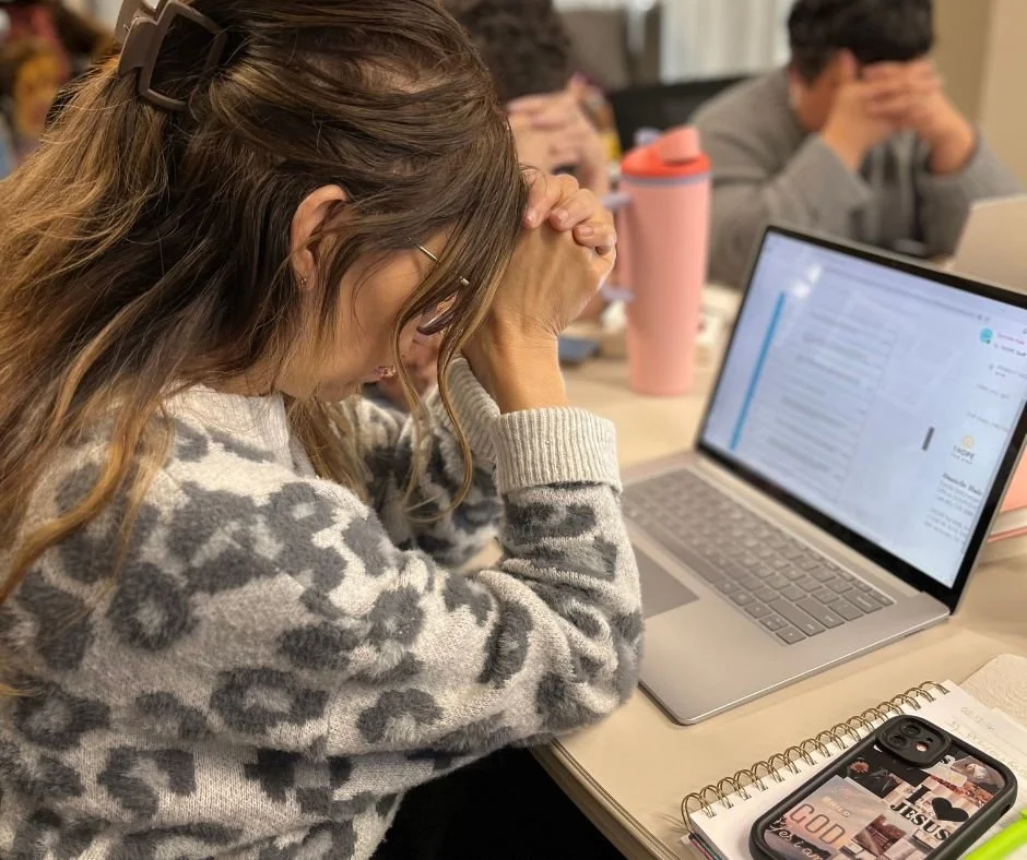 1HOPE staff praying over foster families.jpg