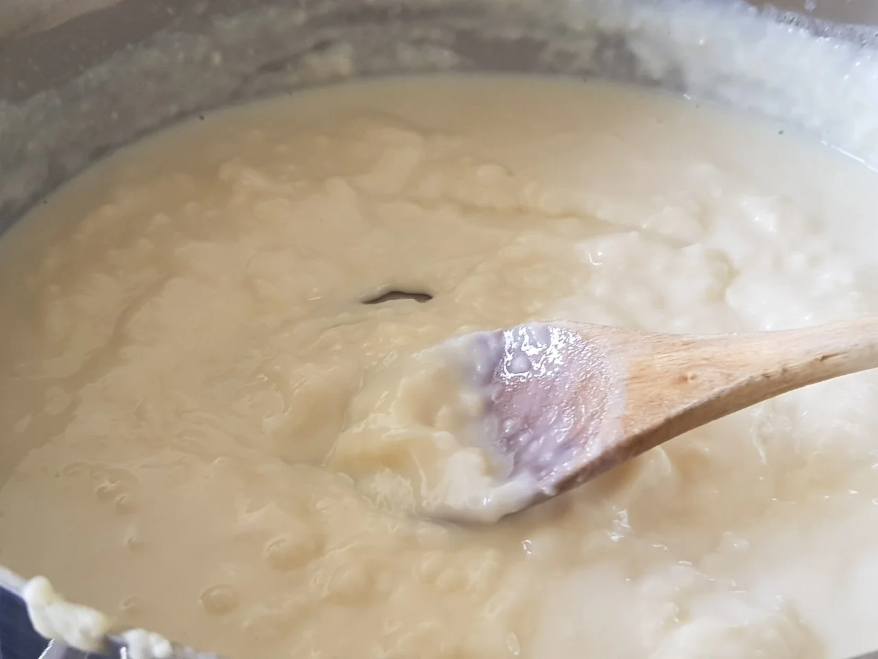 thumbnail_Adding boiled milk slowly and mixing.jpg