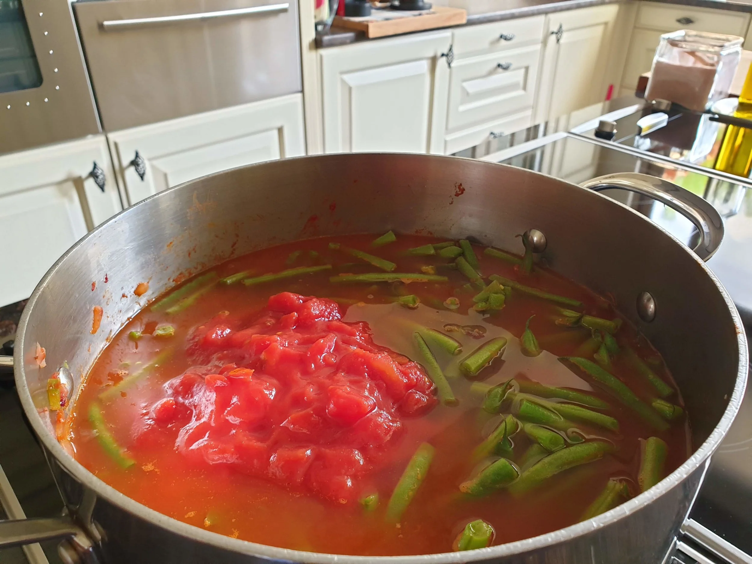 adding water and tinned tomato.jpg