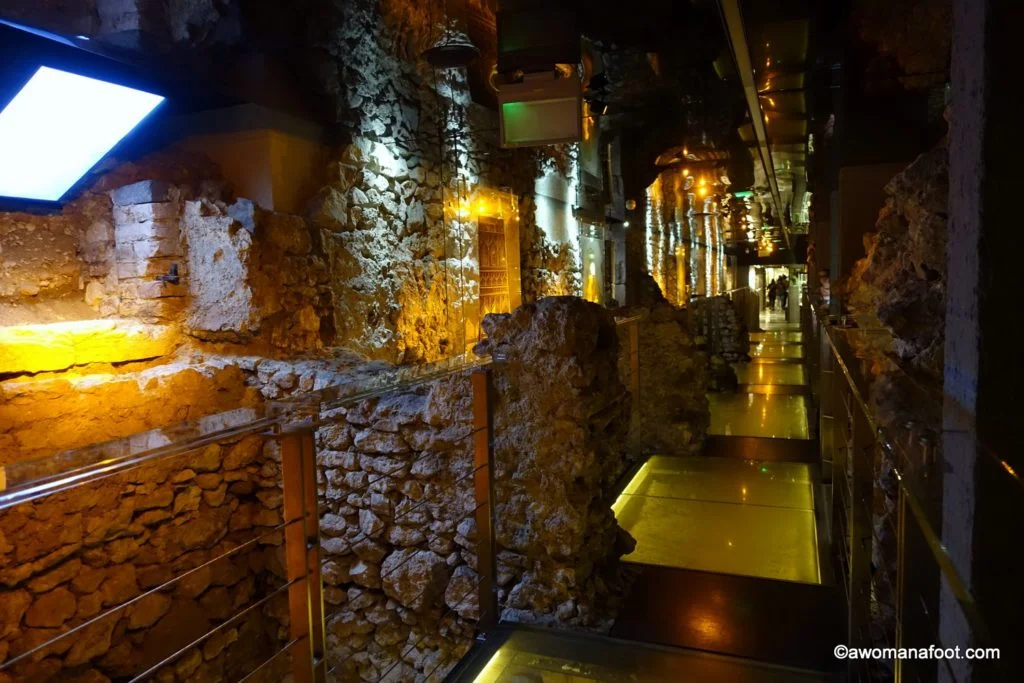 Krakow's Underground Museum: a true hidden gem that you must put on your Krakow's itinerary! Discover 1000 years of Krakow's history unearthed by archaeologists just a few years ago! A must-see for all history buffs and culture travelers! Learn more about the museum @ awomanafoot.com | What to do in Krakow | Krakow off the beaten path | Archaeological Museum | Main Square in Krakow | #Krakow #Museum #Archaeology #Travel #UniqueDestination #MiddleAges #Europe