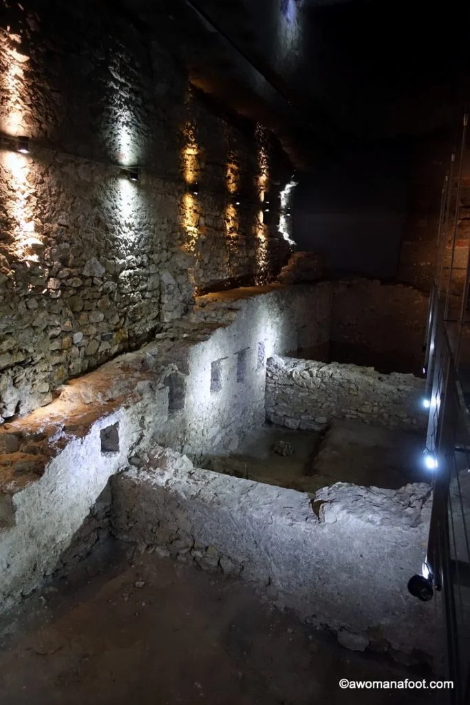 Krakow's Underground Museum: a true hidden gem that you must put on your Krakow's itinerary! Discover 1000 years of Krakow's history unearthed by archaeologists just a few years ago! A must-see for all history buffs and culture travelers! Learn more about the museum @ awomanafoot.com | What to do in Krakow | Krakow off the beaten path | Archaeological Museum | Main Square in Krakow | #Krakow #Museum #Archaeology #Travel #UniqueDestination #MiddleAges #Europe