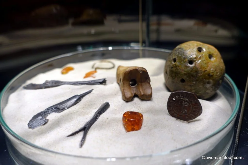 Krakow's Underground Museum: a true hidden gem that you must put on your Krakow's itinerary! Discover 1000 years of Krakow's history unearthed by archaeologists just a few years ago! A must-see for all history buffs and culture travelers! Learn more about the museum @ awomanafoot.com | What to do in Krakow | Krakow off the beaten path | Archaeological Museum | Main Square in Krakow | #Krakow #Museum #Archaeology #Travel #UniqueDestination #MiddleAges #Europe