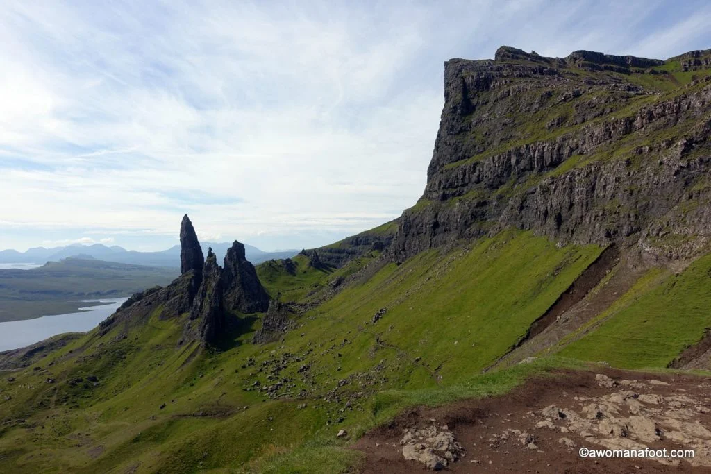The Old Man of Storr is the most iconic place on the Isle of Skye. Read this article to learn how to hike it for magnificent views and unforgivable adventure! awomanafoot.com | Hiking trails in Scotland | What to do on the Isle of Skye | Best activities in Scotland | Scottish travel | Best travel destinations in Europe | #Skye #Storr #Scotland #Hiking #Solo #HikingTrail #FemaleHiker #Travel #Europe #ActiveTravel