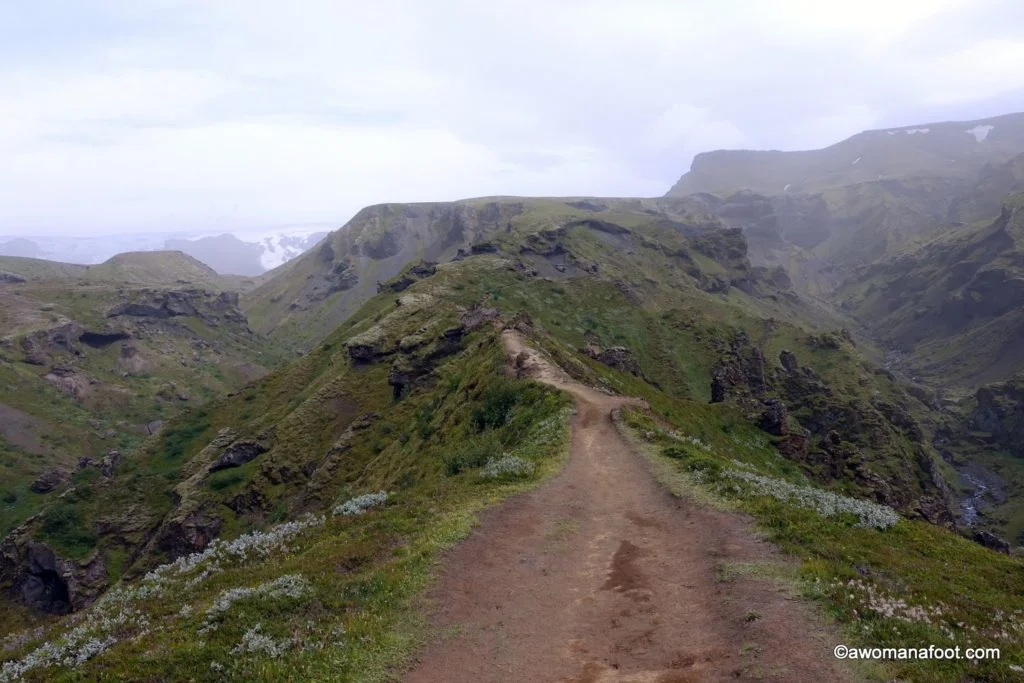 The Fimmvörðuháls trail in southern Iceland is a challenging and stunningly beautiful hiking path leading through the Land of Fire and Ice. Hiking in Iceland | Iceland Travel | Solo travel | Awomanafoot.com