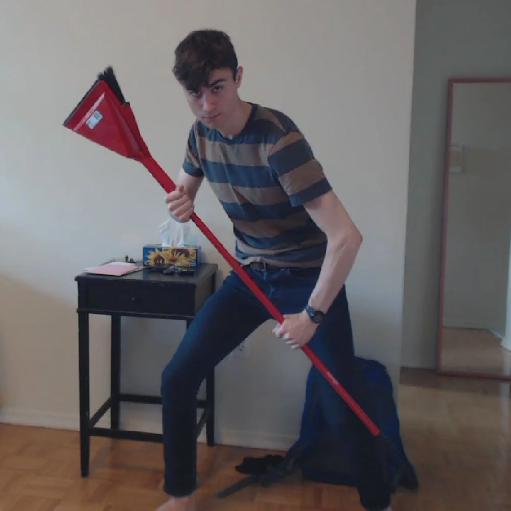 Sometimes your work demands of you to pose with a broom in your living room. You cherish those moments.