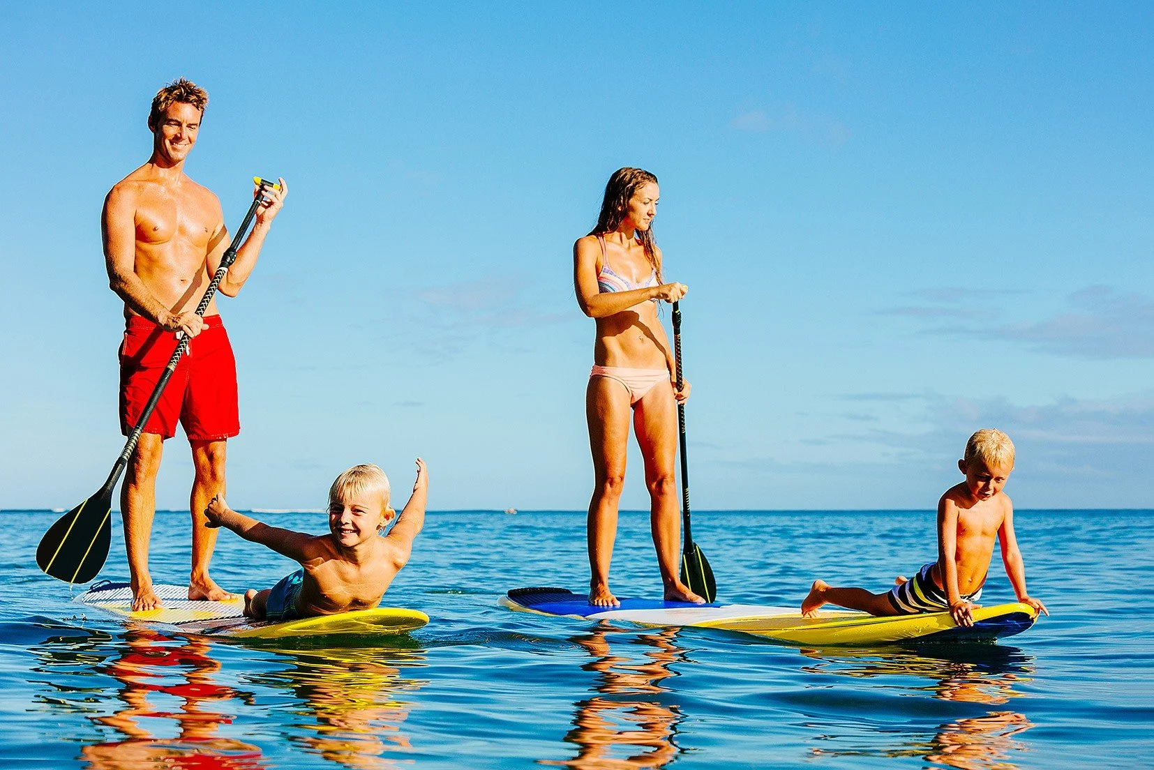 family on paddleboards.jpg