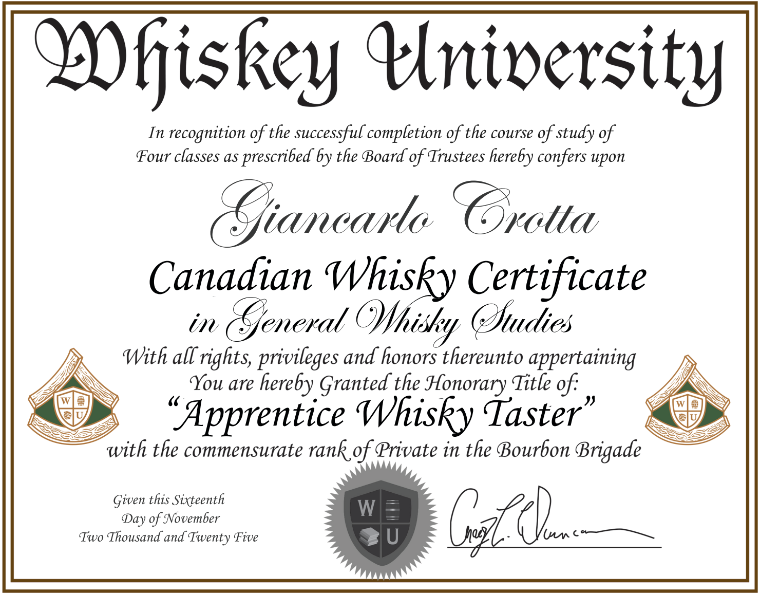 A ceremonial certificate from Whiskey University awarded to Giancarlo Crotta for completing a general whisky studies course, with decorative shields, a seal at the bottom, and a signature.