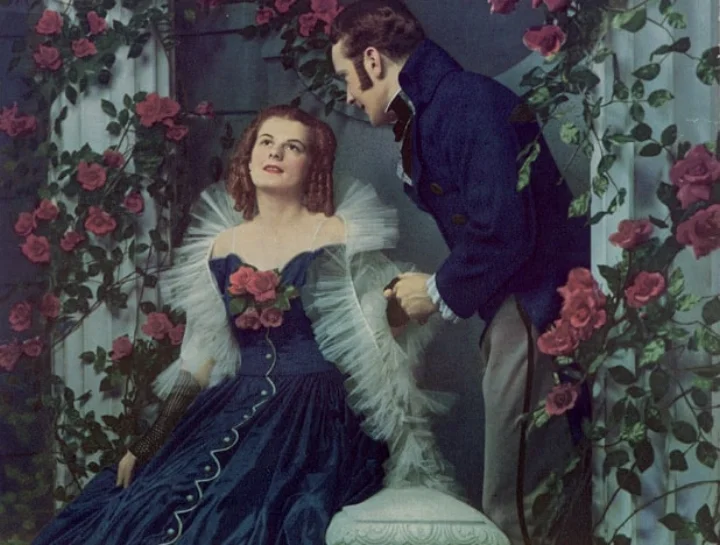 Paul Jones, Jr. is thrilled after he sees his Southern Belle's response to his proposal at the Grand Ball by wearing a corsage of "Four Roses" to express her agreement.