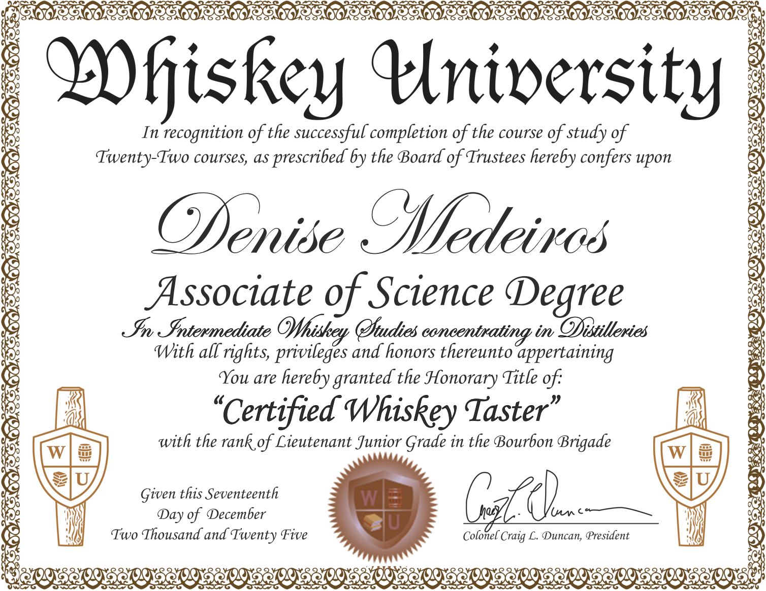 A certificate from Whiskey University recognizing Denise Medeiros for completing 22 whiskey courses, conferring her the title of Certified Whiskey Taster, signed by Colonel Craig L. Duncan.