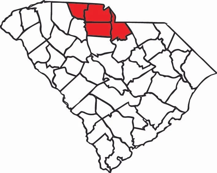 Map of South Carolina showing counties in the northern part highlighted in red.