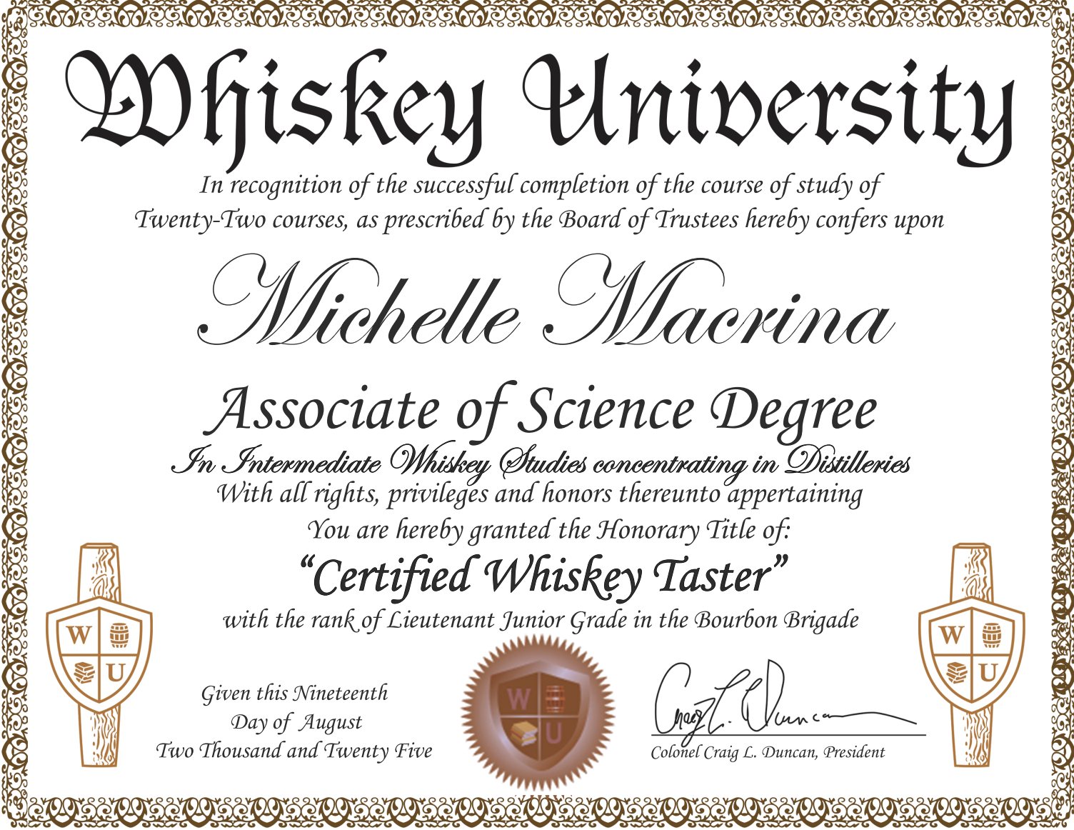 Whiskey University diploma awarded to Michelle Macrina for completing whiskey studies, featuring decorative borders, a shield emblem, and a signature.