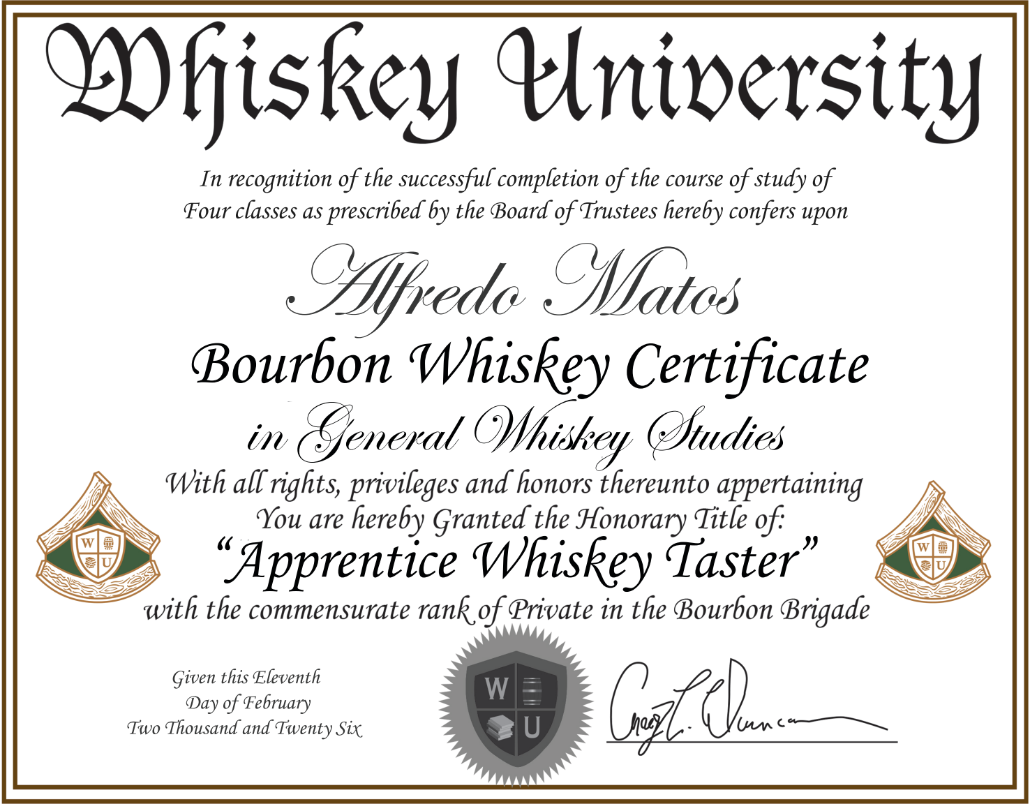 Certificate from Whiskey University awarded to Alfredo Matos for Bourbon Whiskey study, March 11, 2016, with university logos and signature.