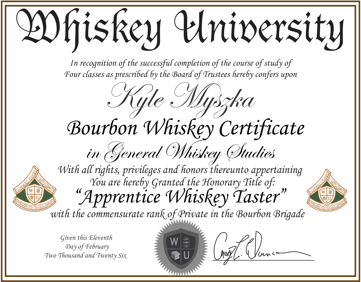 A bourbon whiskey certificate from Whiskey University awarded to Kyle Myszka, with a black and gold decorative border and emblems on the lower corners.