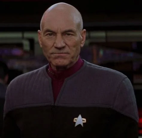 &ldquo;The acquisition of wealth is no longer the driving force in our lives. We work to better ourselves and the rest of humanity.&rdquo; -Picard (Star Trek)
