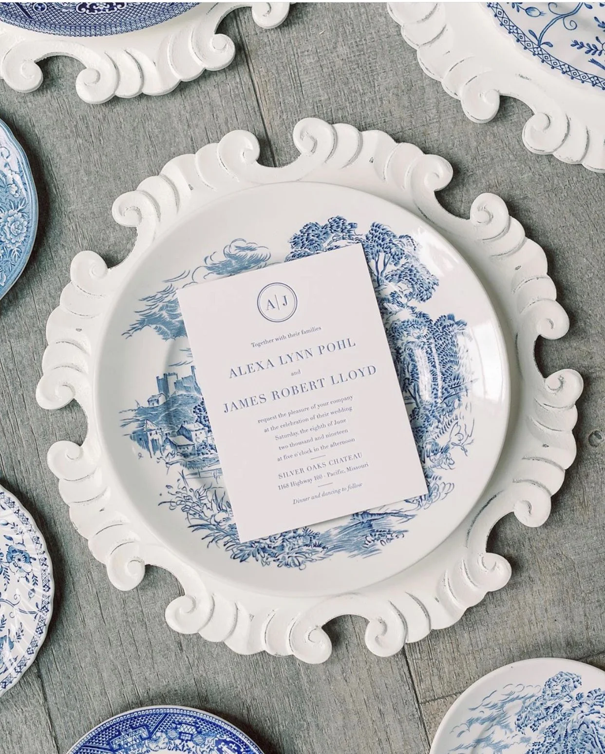 antique white scallop charger.jpeg