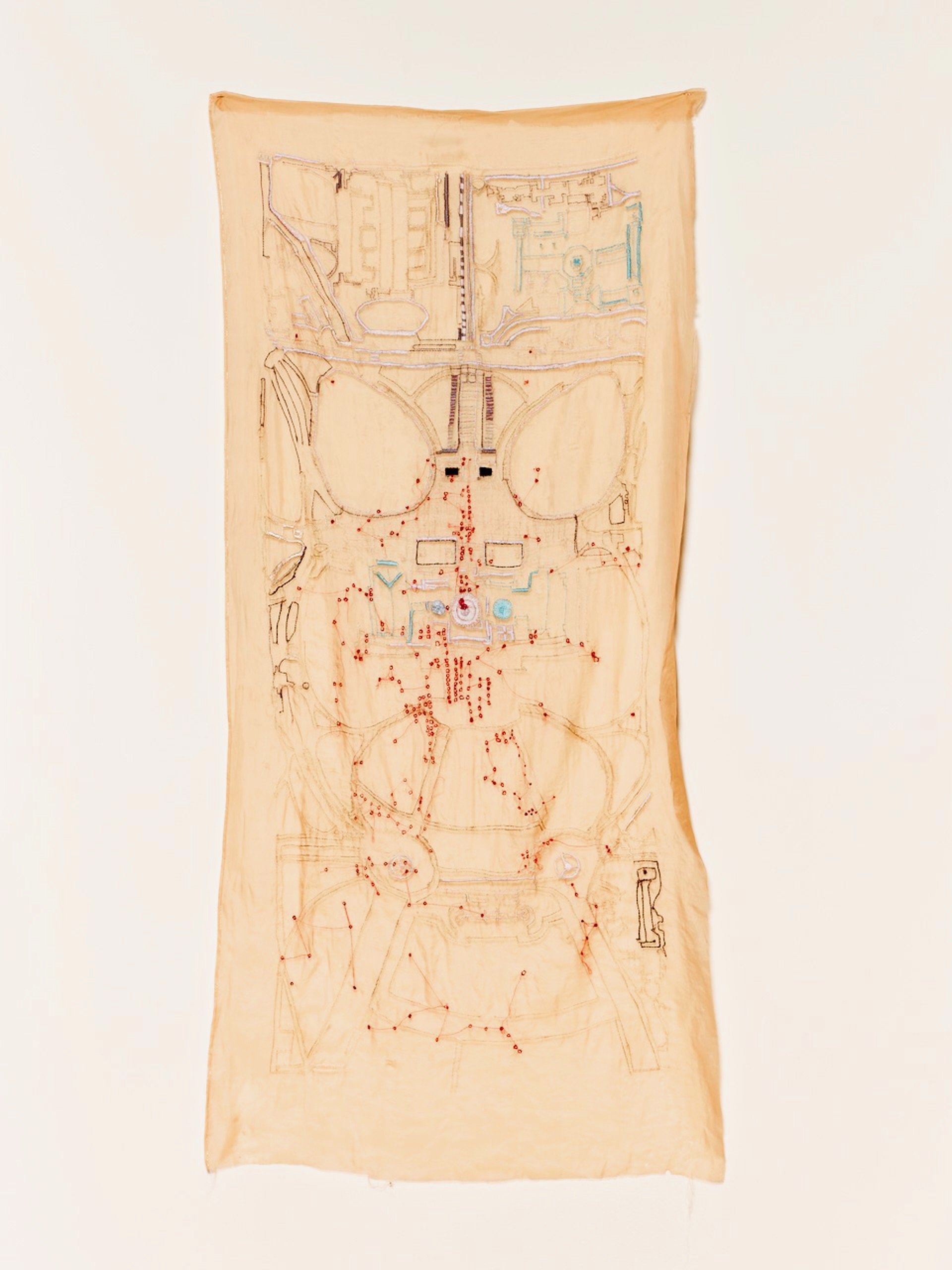 "January 6, 2021, America"
Hand Embroidered on silk organza. 36 x 12 inches. Bird’s eye view of the US Capital that day.  The red stitches mark the geo-tags from many of those present.