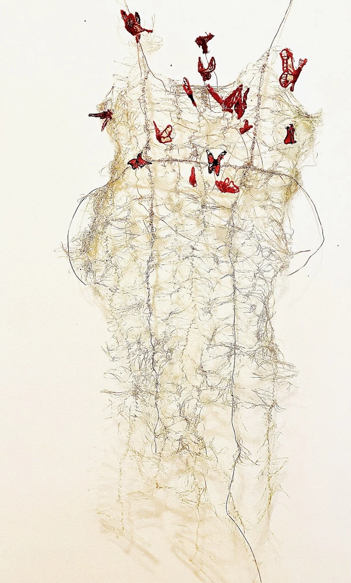 ". . .and her body became butterflies" 
Wire dress sculpture, hairpin laced by hand with hand embroidered butterflies. 36" x 12" x 5".