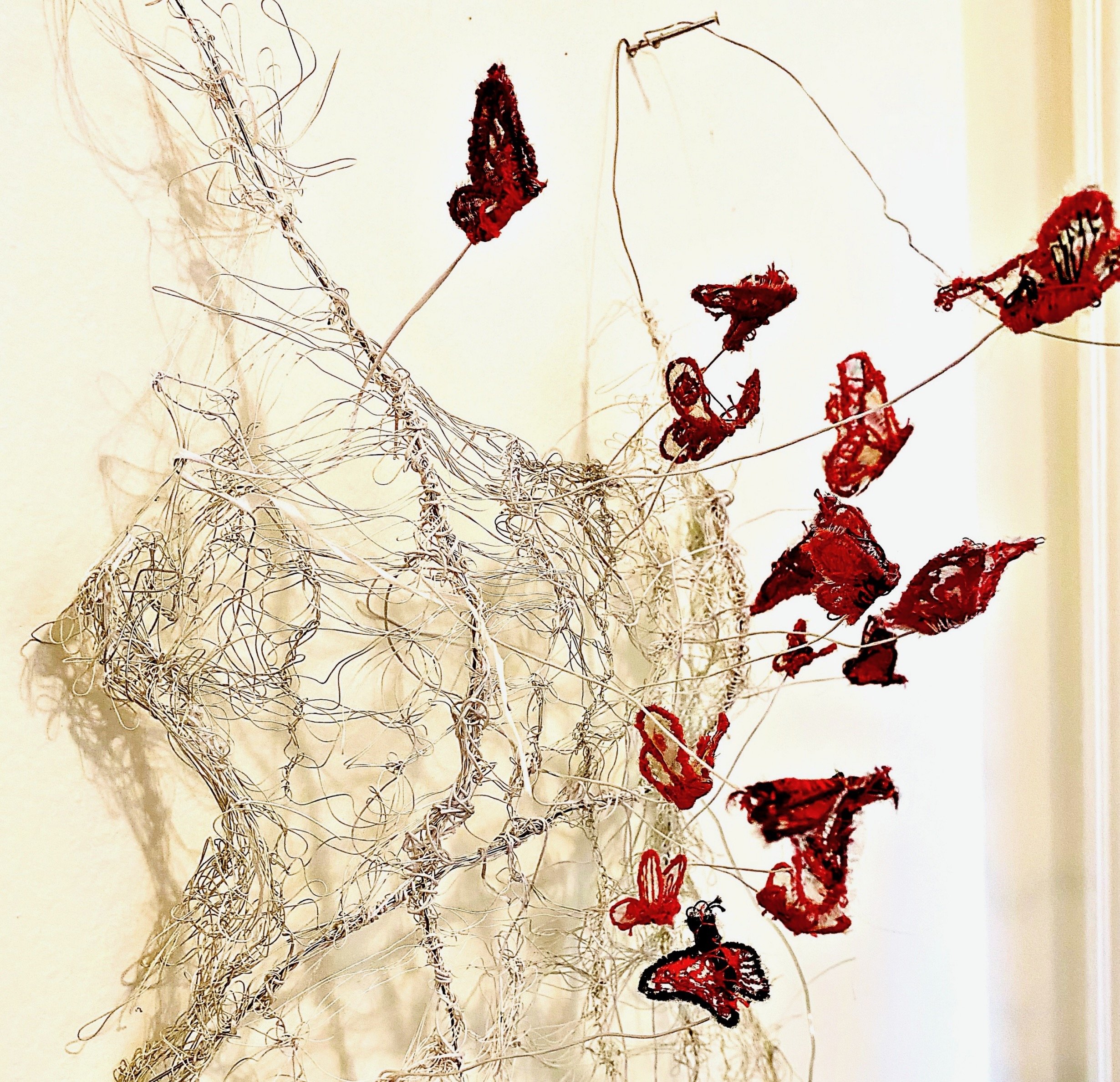 ". . .and her body became butterflies"[DETAIL]
Wire dress sculpture, hairpin laced by hand with hand embroidered butterflies. 36" x 12" x 5".