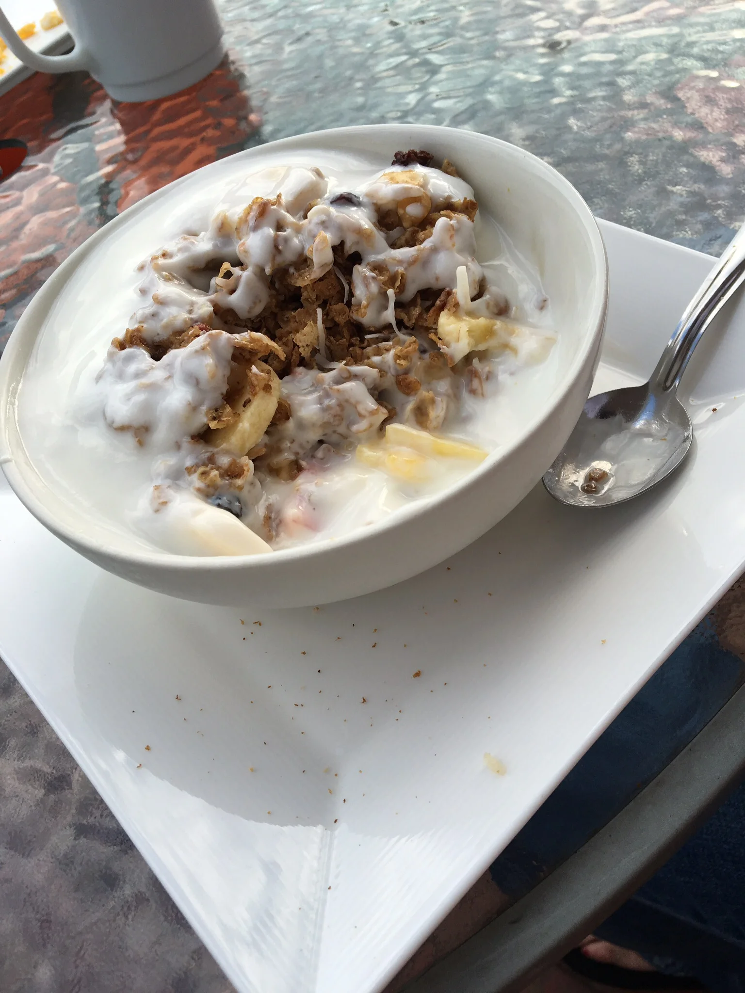 Delicious breakfast of fresh fruit, yogurt, & granola at the hostel.