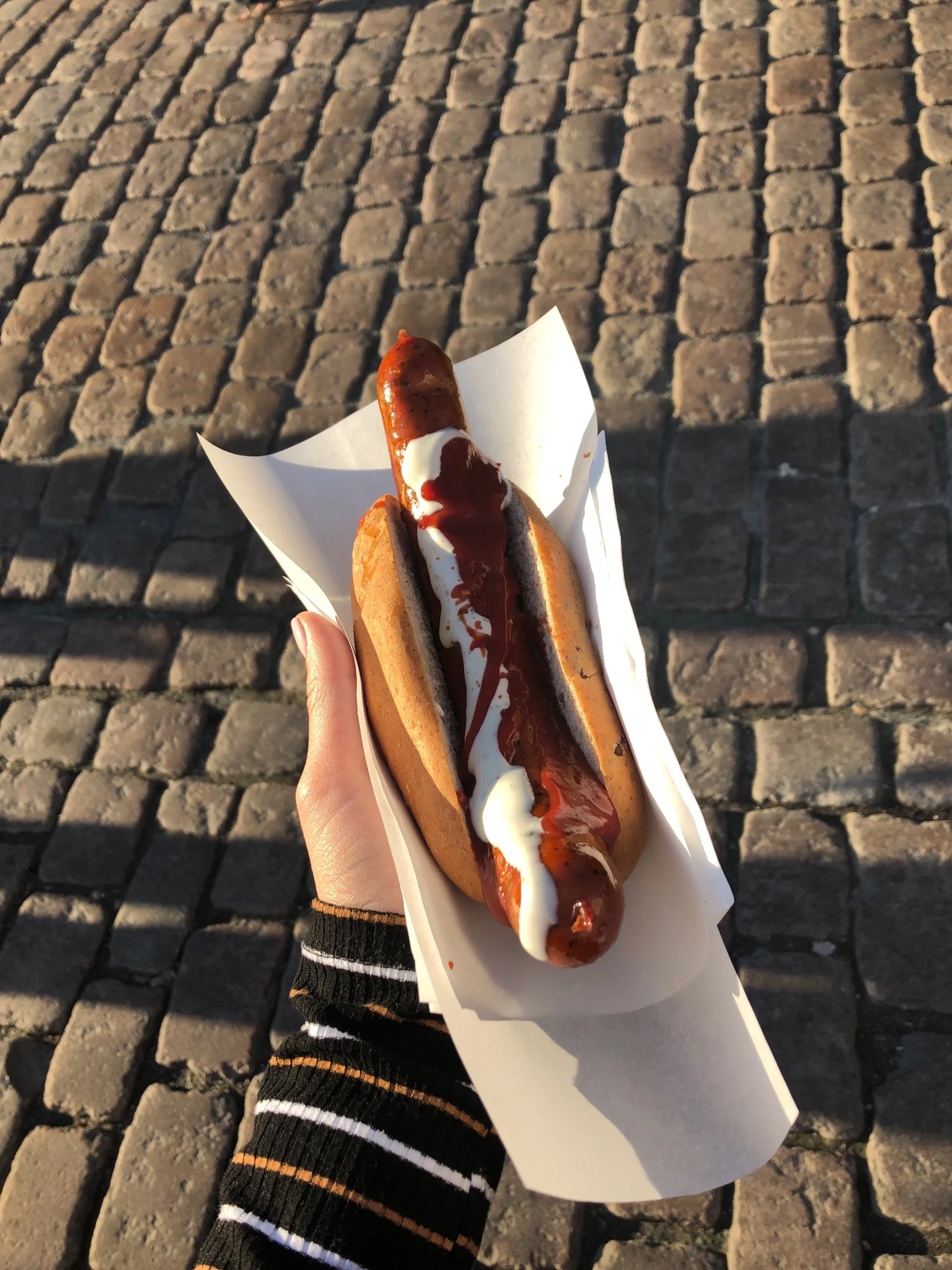 Chili garlic street dog from a famous cart in Bergen - Trekroneren. So good, so cheap (and cheap is a Norwegian rarity).