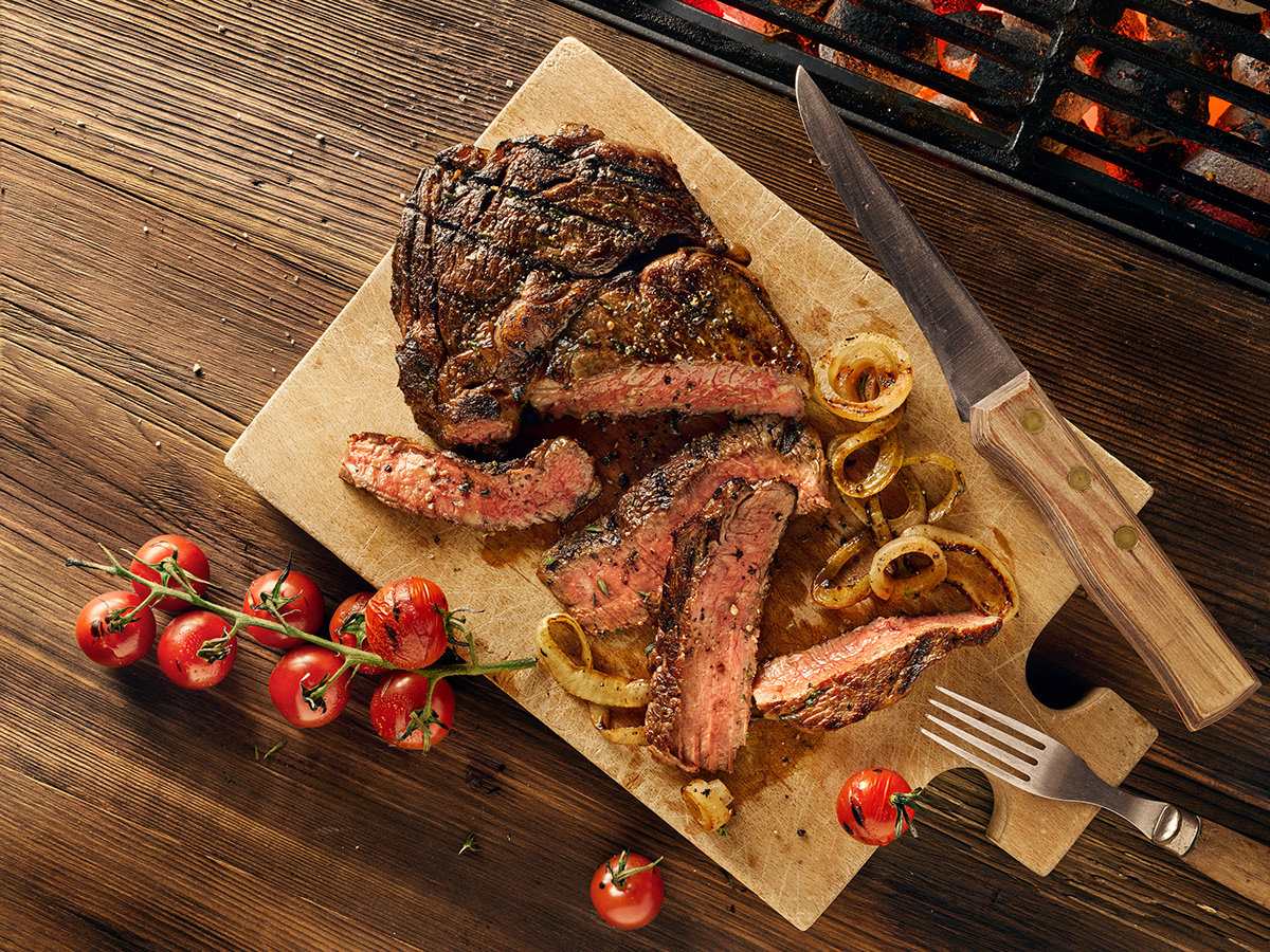 rib eye on cutting board sliced.jpg