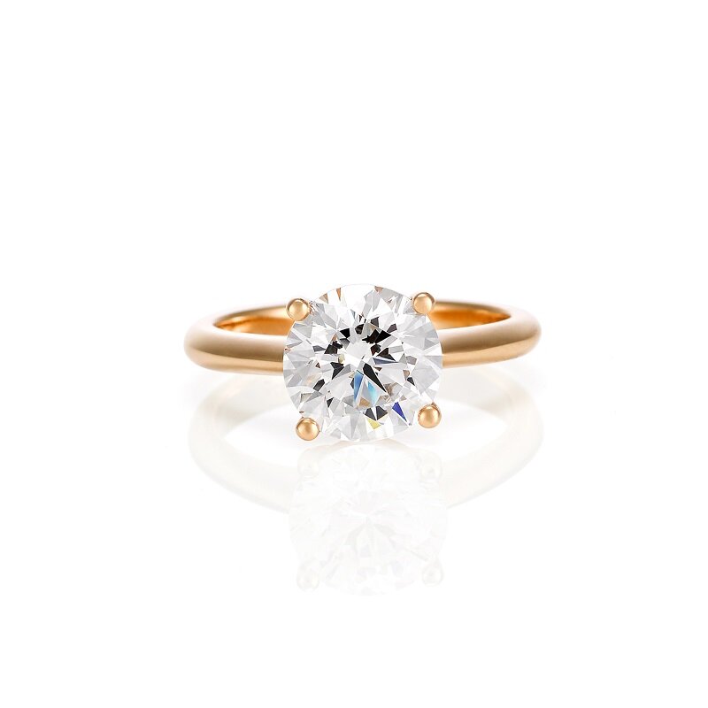 Round Brilliant solitaire Diamond Engagement ring in yellow gold .jpg