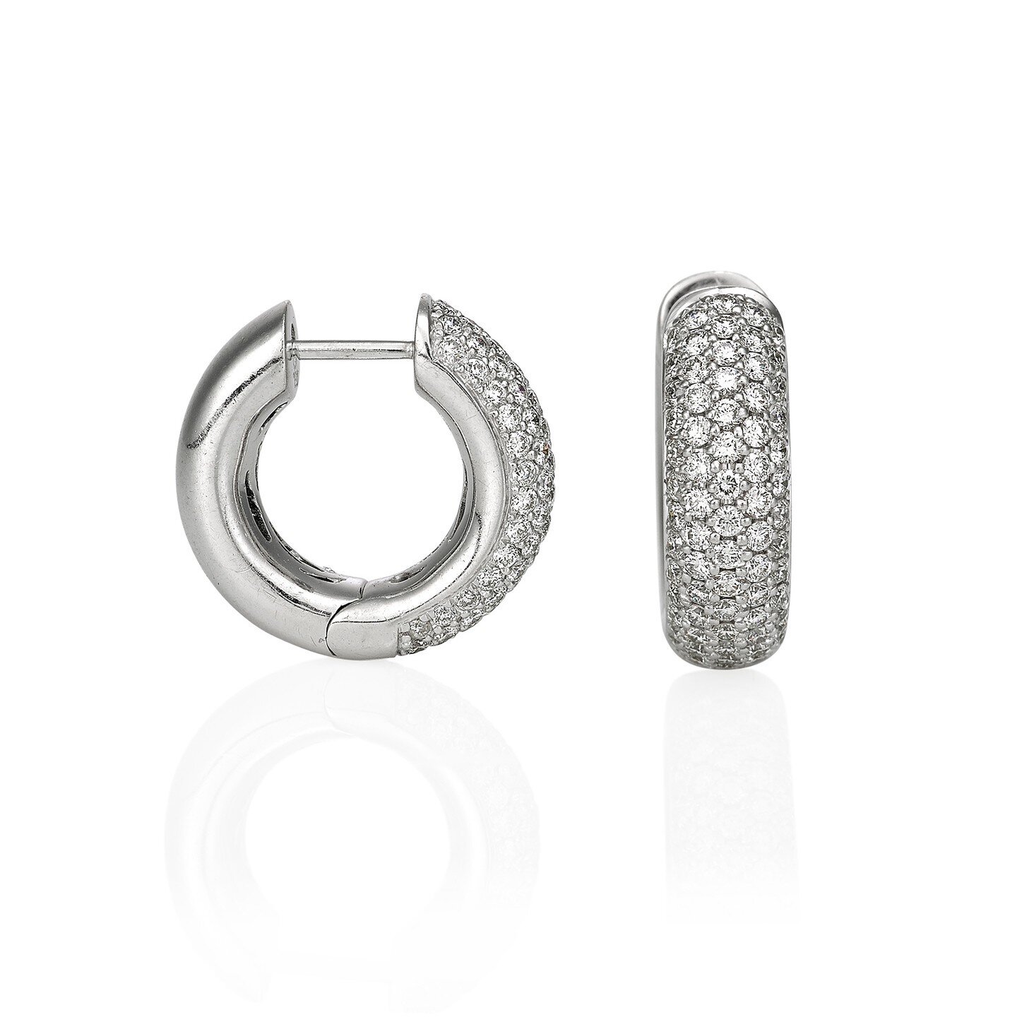 These beautiful honeycomb set diamond earrings take the classic to a new level of bling.