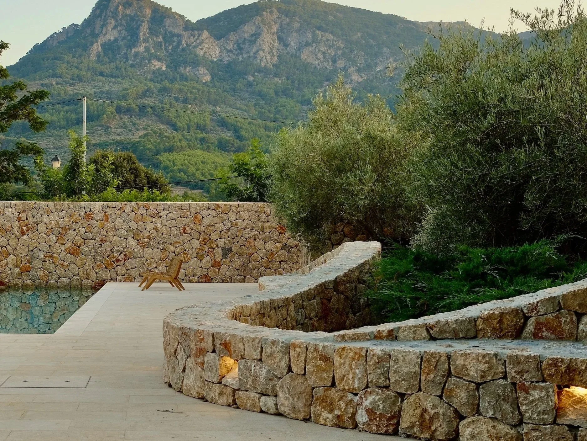 terra+coll+home+villa+winding+stone+wall+with+pool.jpg