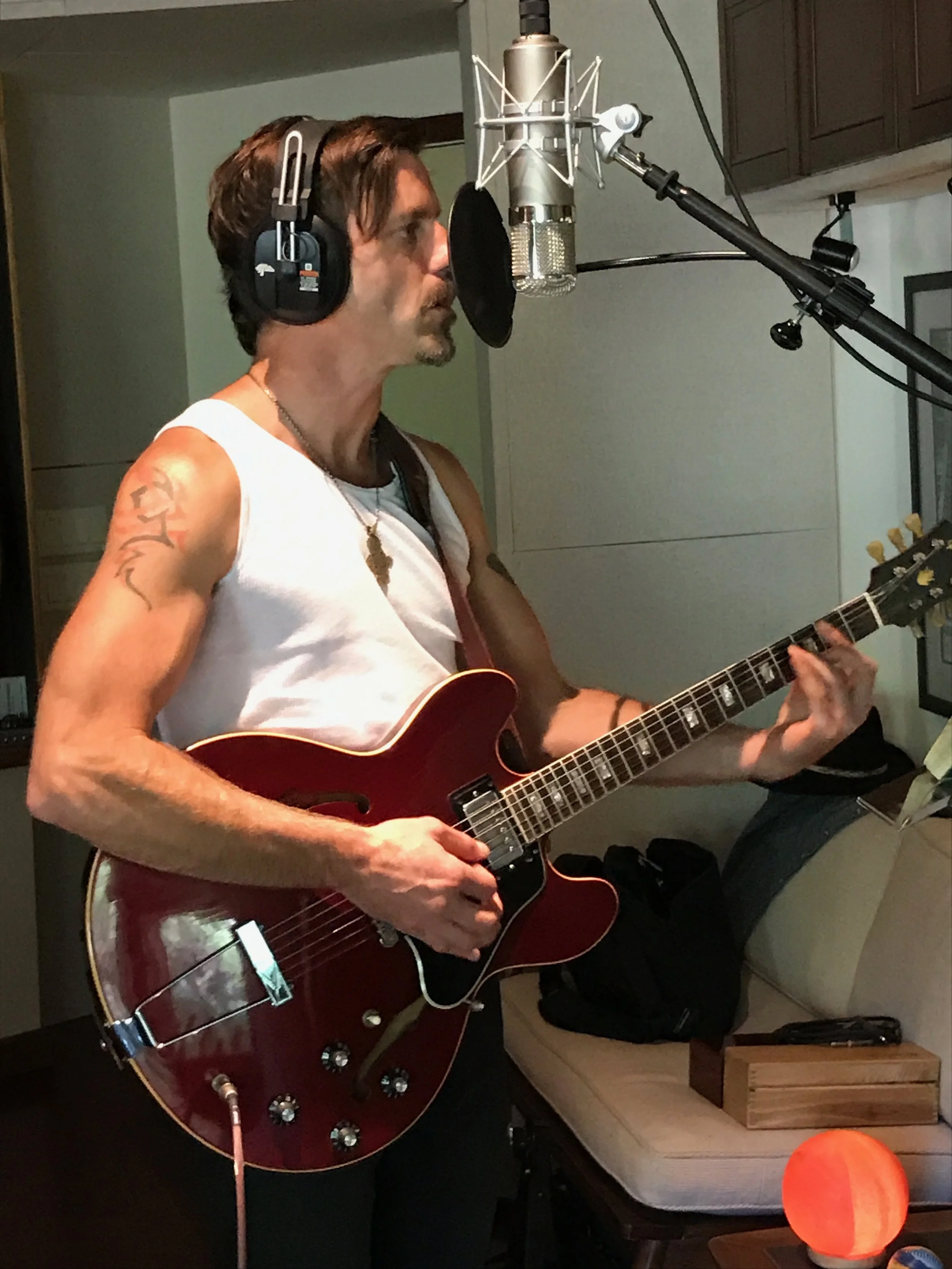 Kurt Singing Tats 2.JPG