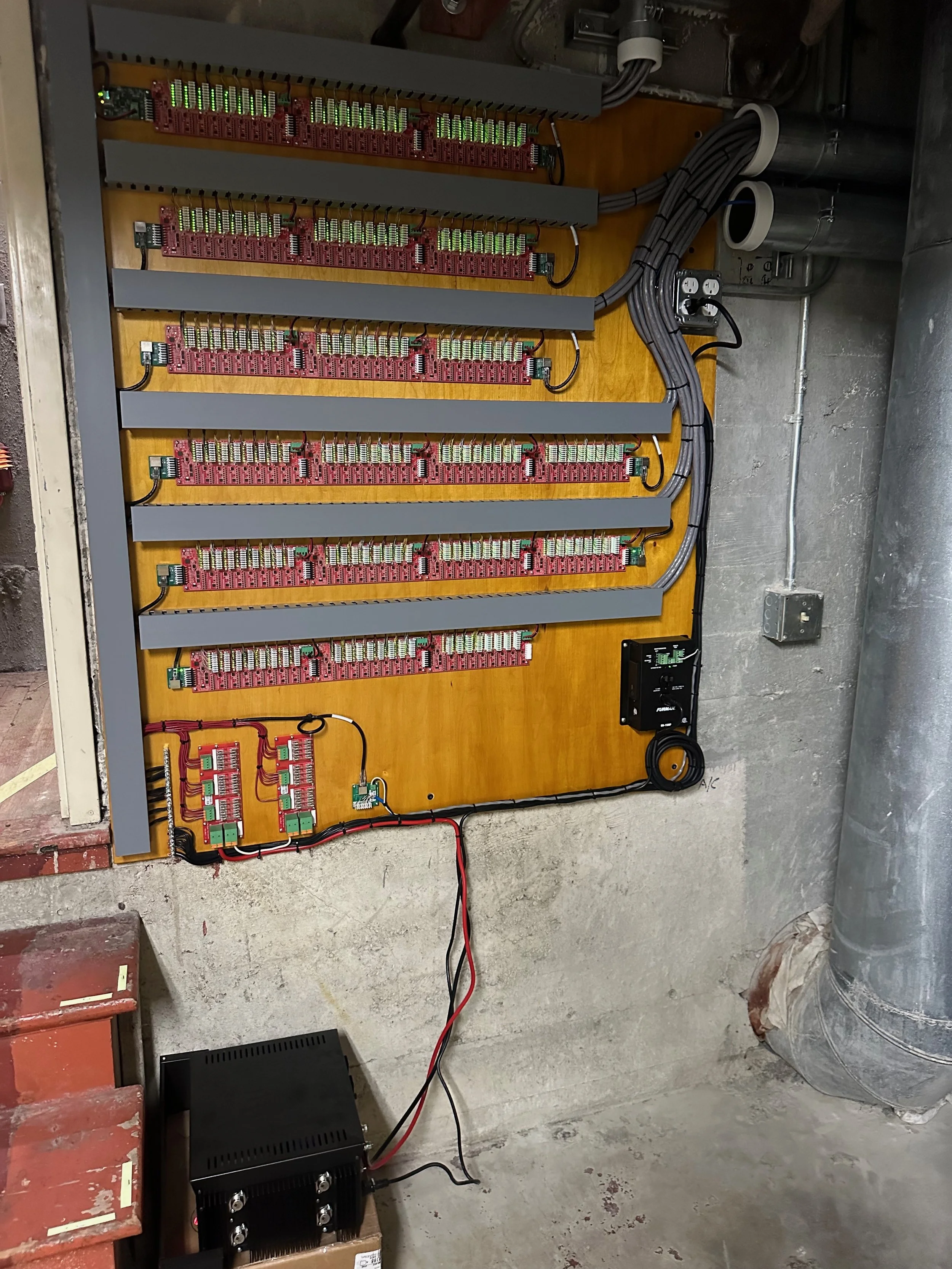 Stanford Theater in Palo Alto - Left Chamber - These cards drive pipes.  There's 1 pipe per wire, 8 wires per white connector, 8 connectors per board, something like 1400 pipes driven from this panel.