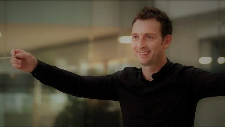 Meet our incredible Innovative and talented musical director John Doyle. 

Having graduated from Trinity College Dublin and the Royal Irish Academy of Music with first class honours, John studied with figures such as George Hurst, (UK) Atso Almila (F