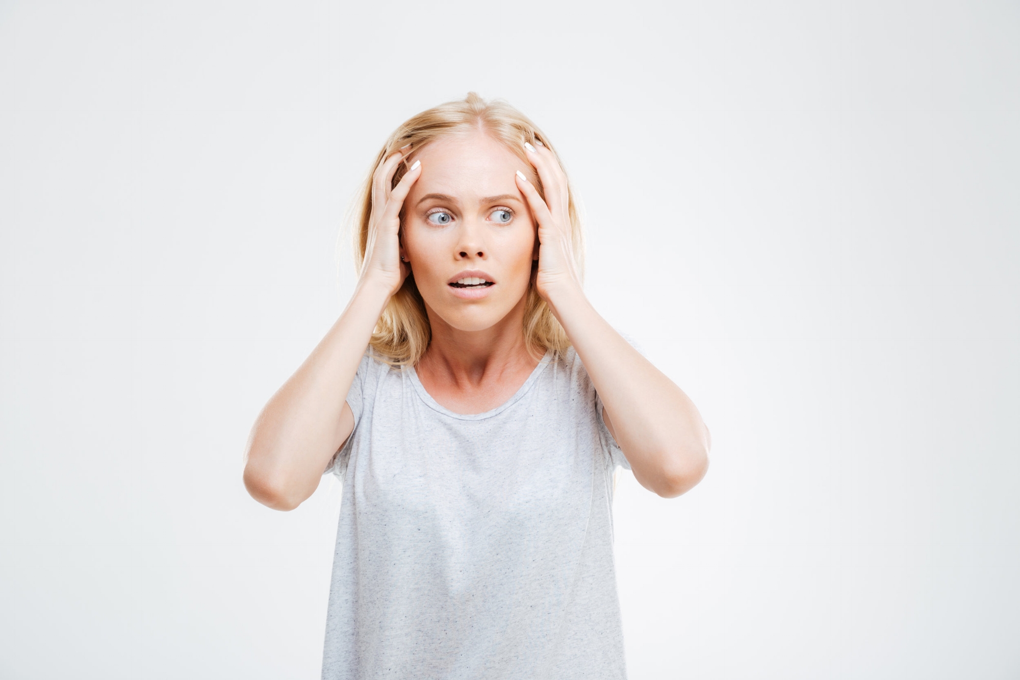 graphicstock-stressed-confused-blonde-woman-standing-isolated-on-a-white-background_B_MnhduShx.jpg
