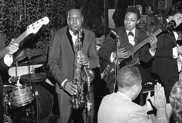 This ATCO promo shot shows Dupree with saxophonist King Curtis and James Marshall Hendrix (playing a right-handed Fender Jazzmaster upside down at far right) at a May 5, 1966, record-release party for Percy Sledge. Photo by William “PoPsie” Randolph