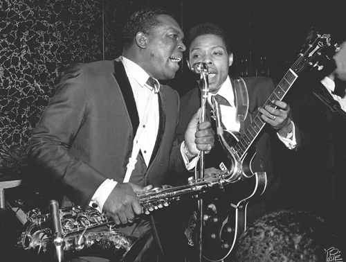 Dupree picks an early-’60s Guild Starfire III with two DeArmond single-coils and a Bigsby B6 tremolo as he shares the mic with King Curtis at a 1966 record-release party for Percy Sledge. Photo by William “PoPsie” Randolph